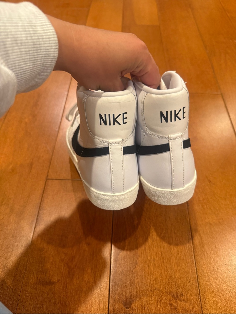 Nike White High-Top Sneakers with Black Swoosh - Picture 7 of 13